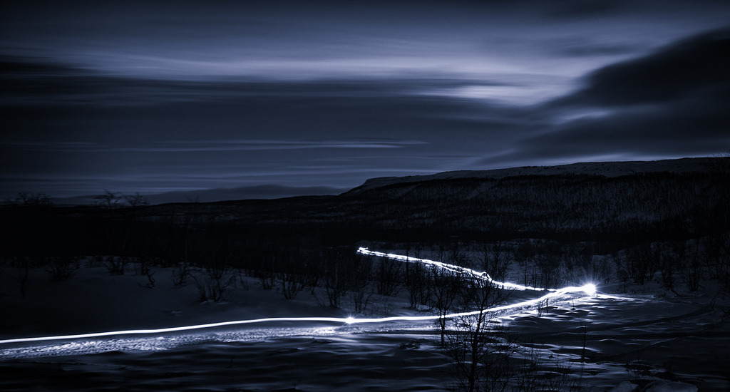 Snowmobile in the dark by L