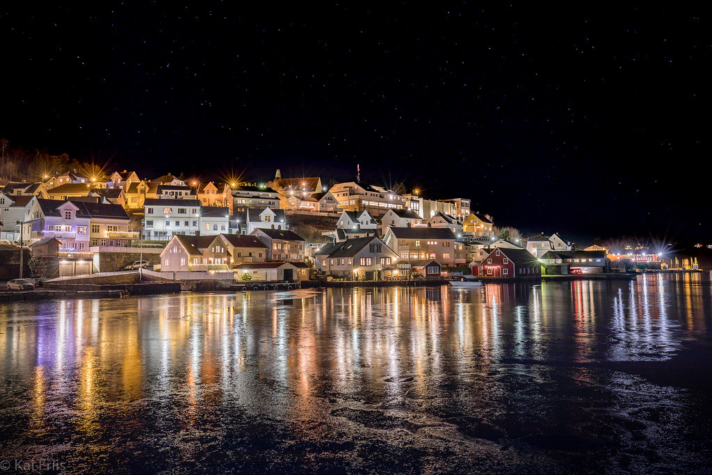A city by a frozen fjord by