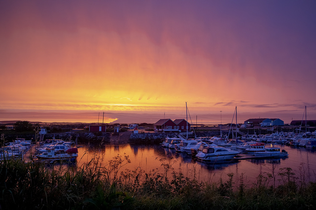 Sunset and rain by G E Nils
